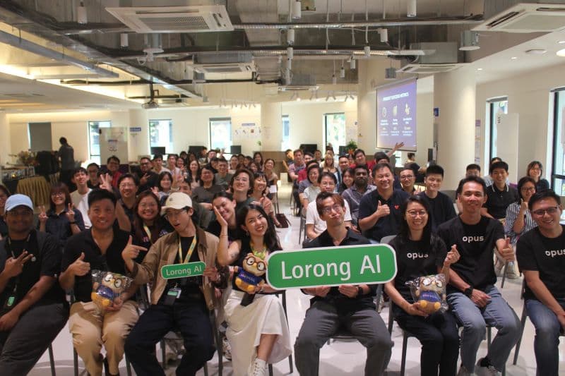 The Data & AI Connect audience at Lorong AI with Opus branding.